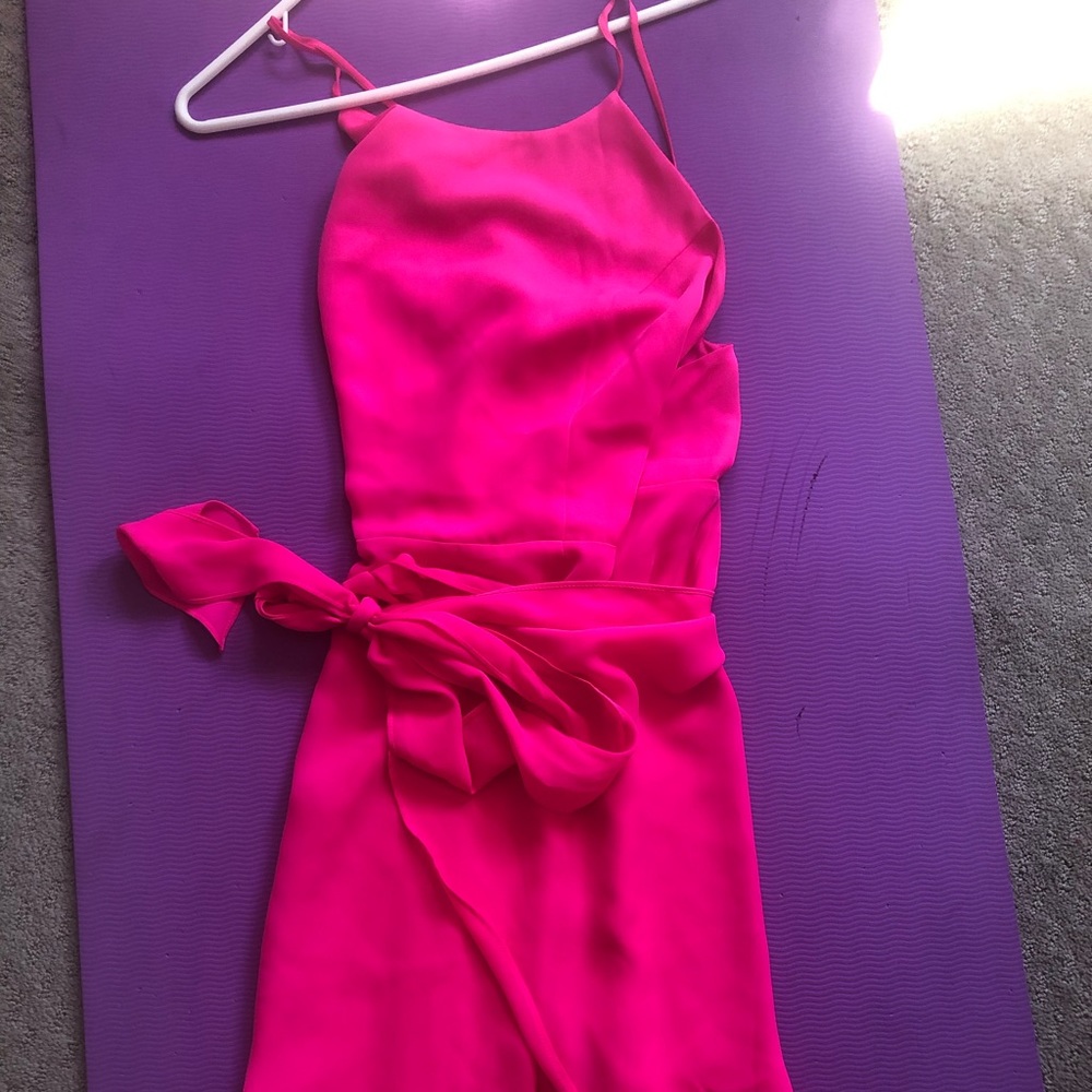 Pretty pink from lulus new with tags. Size L adjustable straps and wrap skirt.